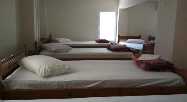 Кровать в общем номере Pella Inn Hostel