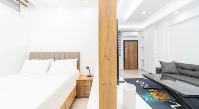 Centrally Located Cozy Studio Flat in Muratpasa, Забронировать Отель Муратпаша 