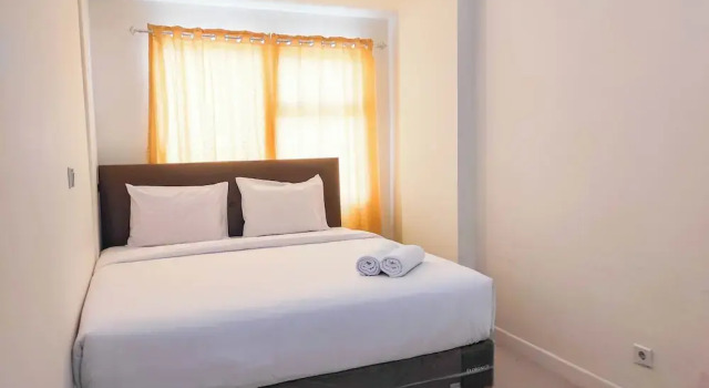 Luxurious 1BR at Vida View Makassar Apartment By Travelio, Prenota Appartamento Hotel a Sulawesi con piscina, Piscina