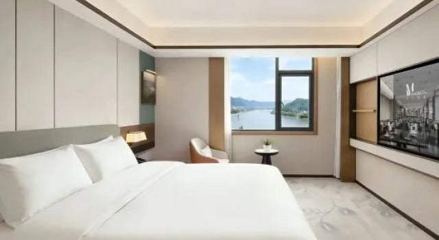 Четырёхместный семейный люкс с 2 комнатами с видом на реку Grand Madison Hotel Wanzhou Wanda Plaza Chongqing