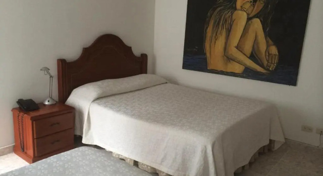 Четырёхместный номер Standard Hotel Bolivar Plaza Manizales