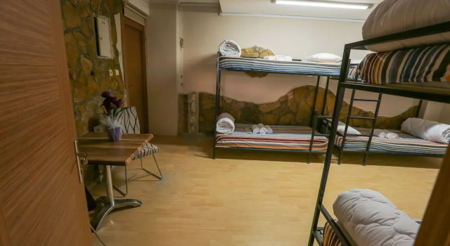 Кровать в общем номере The Macan Hostel