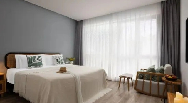 Кровать в общем номере с 6 комнатами Suyu Guesthouse