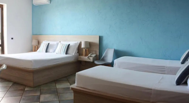 Четырёхместный номер Standard с видом на море Hotel Corallo