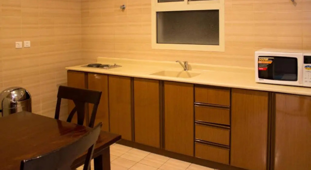 Апартаменты с 4 комнатами Travellerinn hotel apartment ( Family Only )