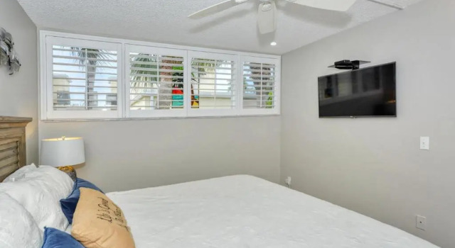 LaPlaya 202E Catch the gentle Gulf breezes on your private balcony beneath the swaying palms