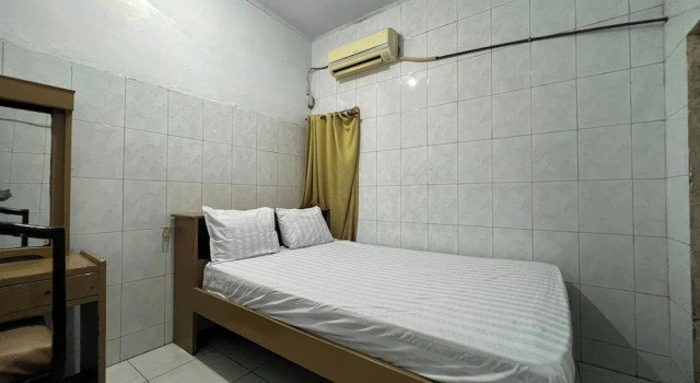 Номер Deluxe OYO 92675 Hotel Rosna