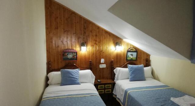 Четырёхместный номер Standard Hostal Martin - Sanabria