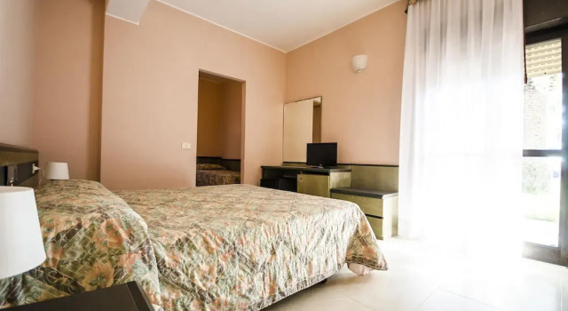 Четырёхместный номер Comfort с красивым видом из окна Torre Del Sole