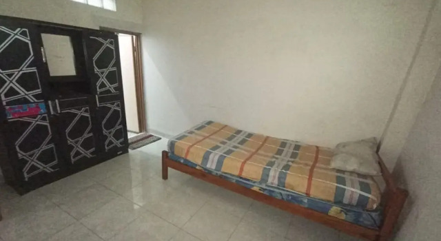 Номер Economy Hotel O Penginapan Hj Lilis 2 Syariah