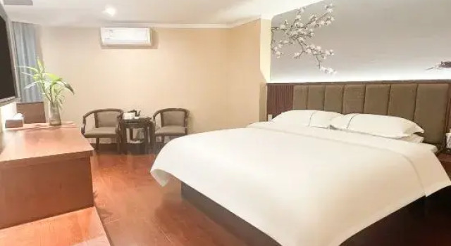 Кровать в общем номере Phoenix Holiday Hotel(Fuzhou University store)