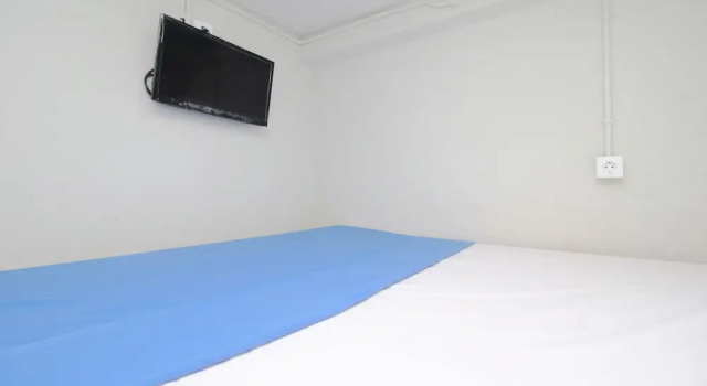 Номер Standard Kamar Keluarga Bandara IV Syariah