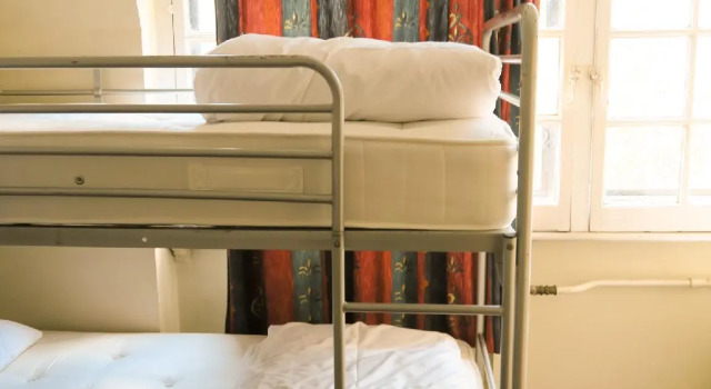 Кровать в общем номере Hotel Strand Continental - Hostel
