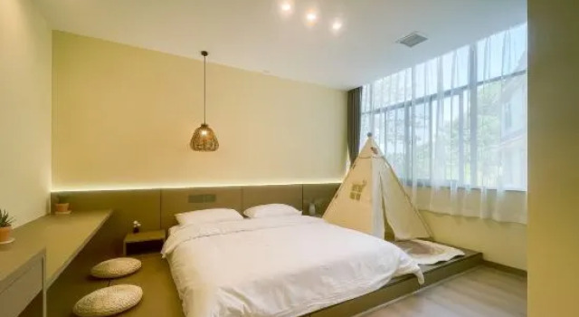 Семейный люкс Youwei Homestay (XingZaiWan)