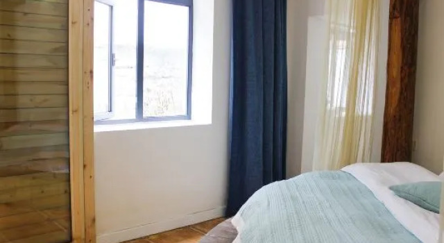 Suite 2 Schlafzimmer mit Poolblick Slow House