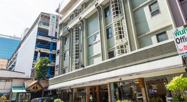 Кровать в общем номере Wall Street Inn, Bangkok