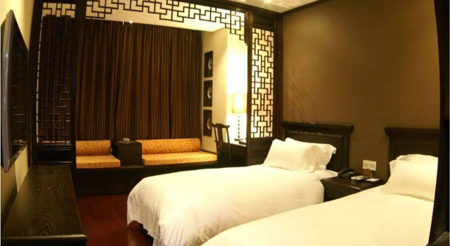 Baolong Homelike Mudanjiang, Varaa Hotelli Hujiazhai Shanghai