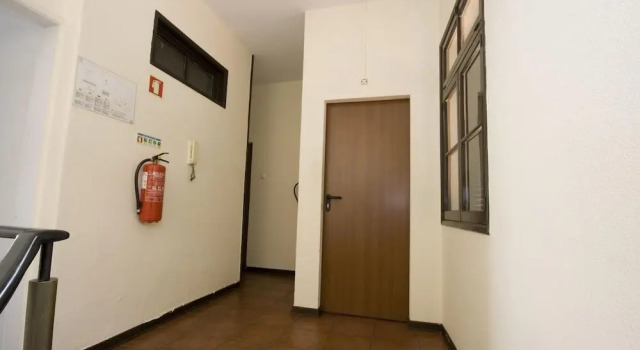 Кровать в общем номере Residencial Funchal