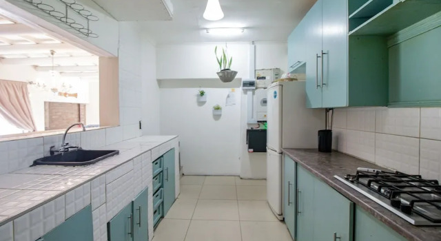 Кровать в общем номере Mauya Guesthouse