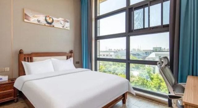 Люкс Deluxe с 2 комнатами Moxilihua Hotel (Renjin Nanyuan)