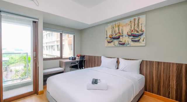 Comfortable Pool View Studio Room at LRT City Jatibening Apartment