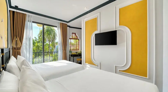 Семейный номер Standard с балконом и с видом на город Rokas Hoi An Boutique Hotel