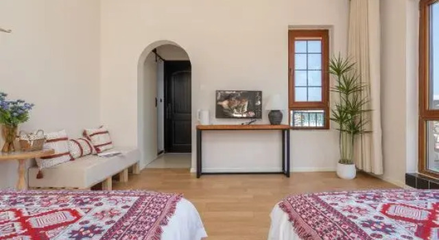 Люкс с 2 комнатами с видом на море Weihai Mu'an Homestay