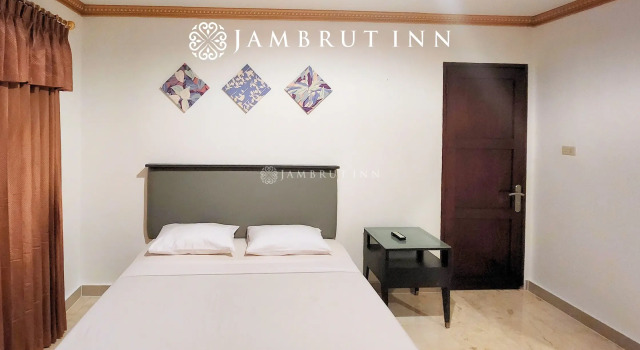 Executivo quarto Jambrut Inn