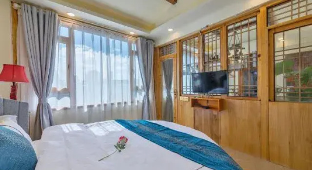 Люкс Lijiang Liangmiaiqing Inn