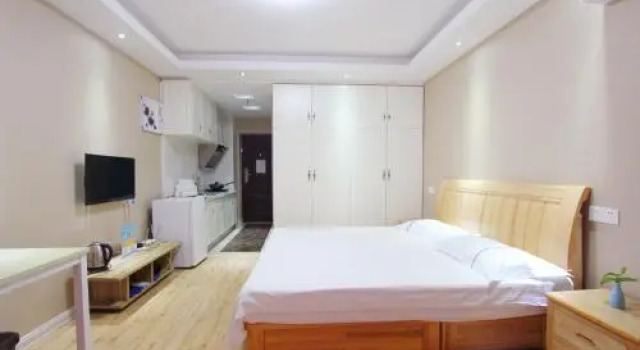 Weihai You Gang Vacation ApartHotel, Rezerwuj Apartamentowiec hotelowy Hotele w Weihai z parkingiem, Parking