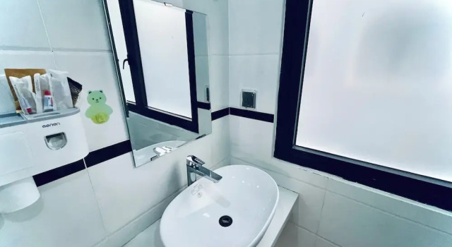 Кровать в общем номере Motel Katie