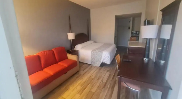 Апартаменты Sunrise Inn by OYO Titusville FL