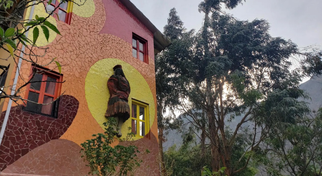 Кровать в общем номере Mama Simona Ollantaytambo