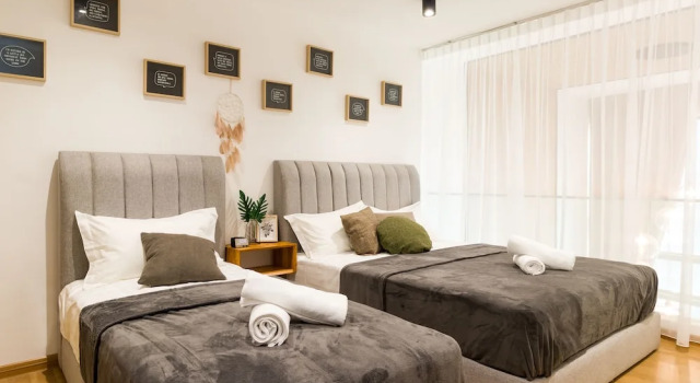 Студия Deluxe EkoCheras Cozy Suite by DreamScape