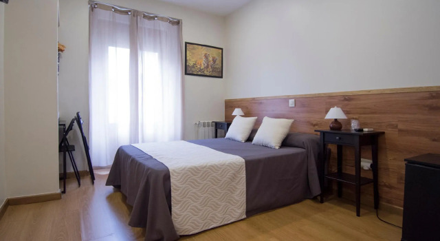 Кровать в общем номере Hostal Art Madrid