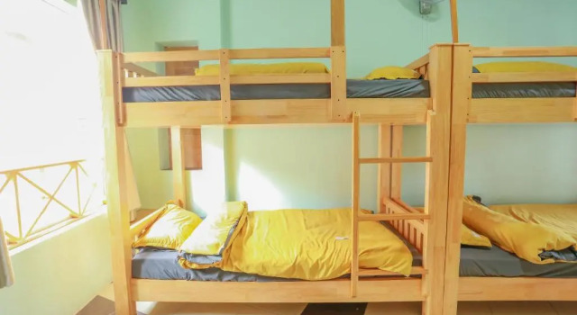 Кровать в общем номере BacHuong Home