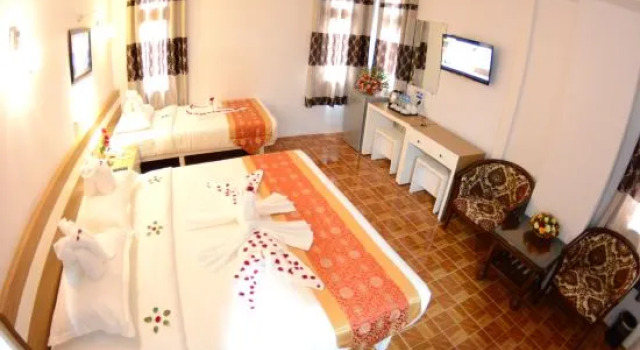 Номер Deluxe Kaung Myint Hotel
