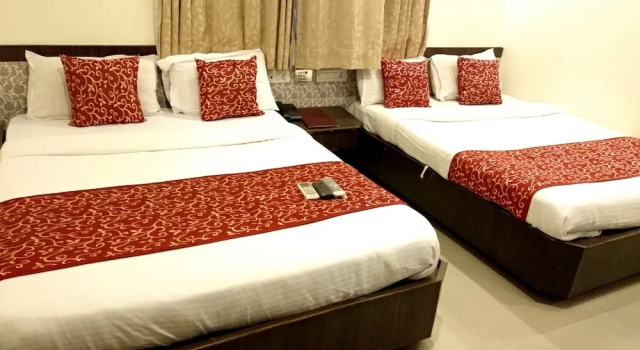 Четырёхместный номер Deluxe c 1 комнатой Hotel Sai Grand Castle Inn