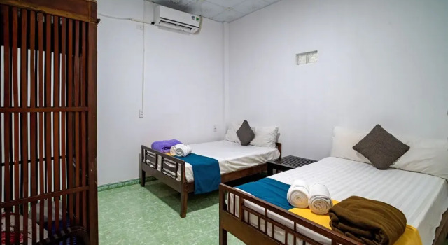 Кровать в общем номере Mia Homestay