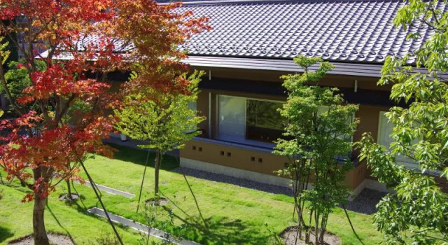 Кровать в общем номере Gero Onsen Yukyunohana