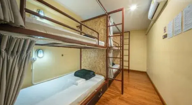 Кровать в общем номере WUA LAI Boutique Hotel Chiang Mai