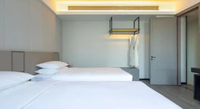 Семейный люкс с 2 комнатами Holz Riez Hotel (Near The Forbidden City , Marshal Zhang's Mansion and Liaoning Provincial Museum)?