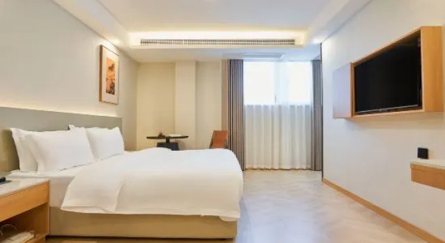 Люкс Sanchuan Hotel (Mingzhu Square Huaishang District Government Branch)