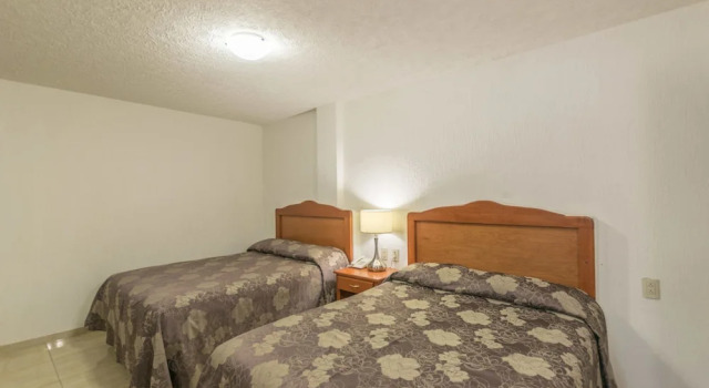 Четырёхместный номер Standard Suites Poliforum Inn