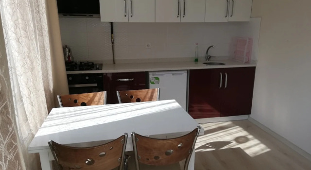 Apartament 1 sypialnia i balkonem i z częściowym widokiem na morze A Suit Residence