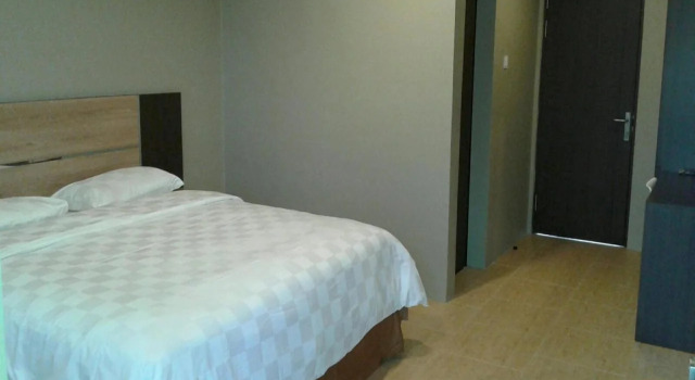 Hotel Hanggar 21, Забронировать Отель Танджунгпандан Суматра