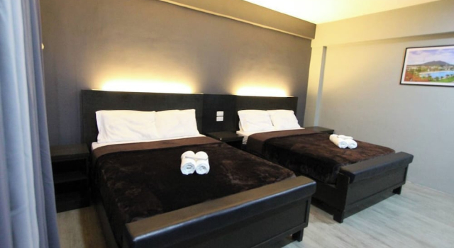 Deluxe huone Palm Cabanas Resort