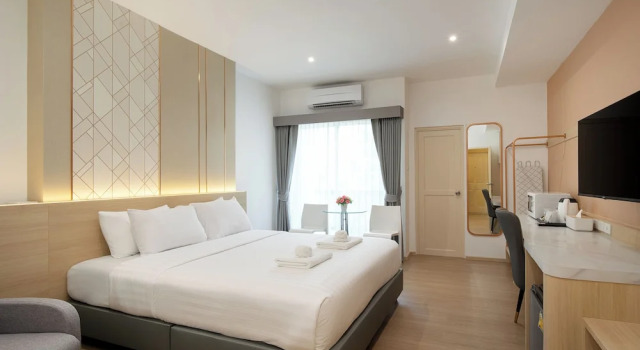 Двухместный номер Deluxe с балконом Riski Residence Ngamwongwan