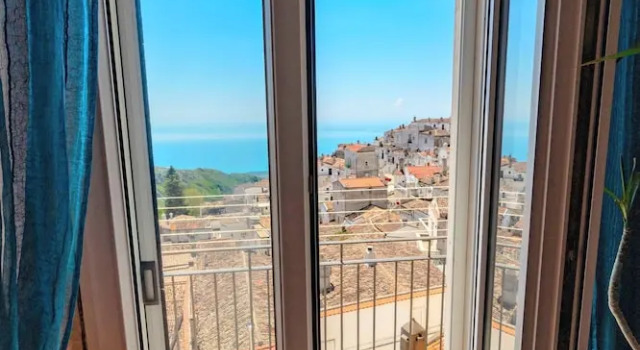 Апартаменты Appartamento con vista panoramica - Mikha'el Apartment