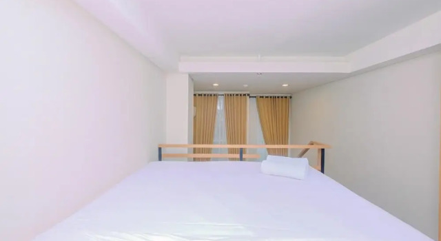 Апартаменты Cozy and Nice Studio Loft Apartment at Apple 1 Condovilla By Travelio
